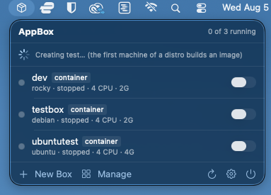 The AppBox dropdown showing a progress row that reads: Creating test… (the first machine of a distro builds an image)